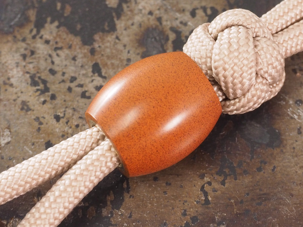 Handmade Barrel Bead for Paracord or Leather Lanyards - 14mm dia. x 15mm - Canyon Ebonite (vulcanised rubber) & Brass