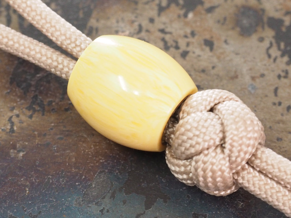 Handmade Barrel Bead for Paracord or Leather Lanyards - 14mm dia. x 15mm - Imitation Antique Ivory (Resin) & Brass