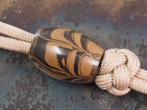 DISCOUNTED ('old stock') Handmade Oval Bead for Paracord or Leather Lanyards - 16mm dia. x 22mm - Ripple Ebonite (vulcanised rubber)