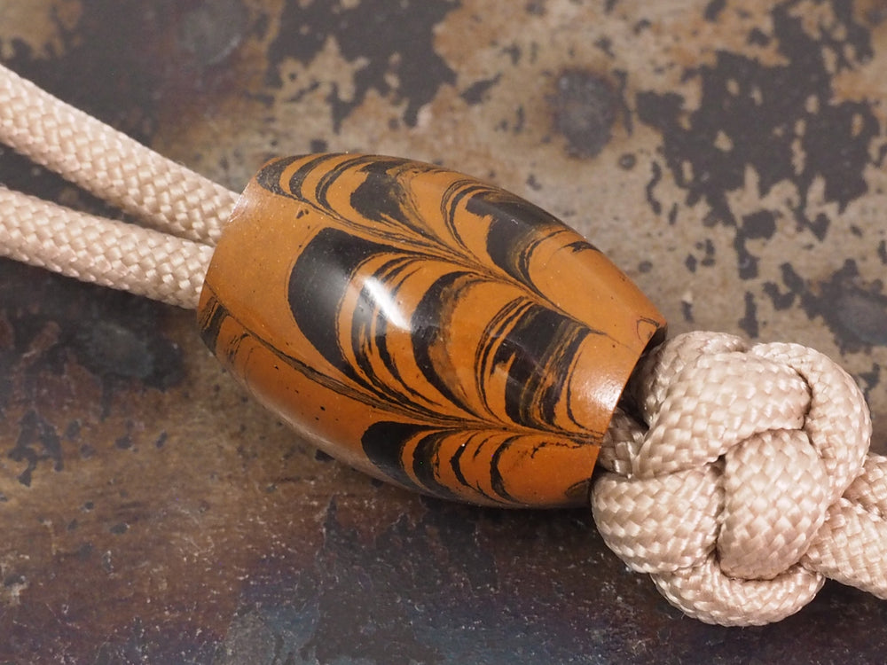 DISCOUNTED ('old stock') Handmade Oval Bead for Paracord or Leather Lanyards - 16mm dia. x 22mm - Ripple Ebonite (vulcanised rubber)