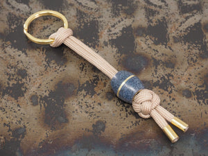 Handmade Diamond Knot Paracord Lanyard Keyring with Barrel Bead (14mm dia. x 15mm) and split ring - Beige Paracord with Blue Denim Micarta & Brass Bead