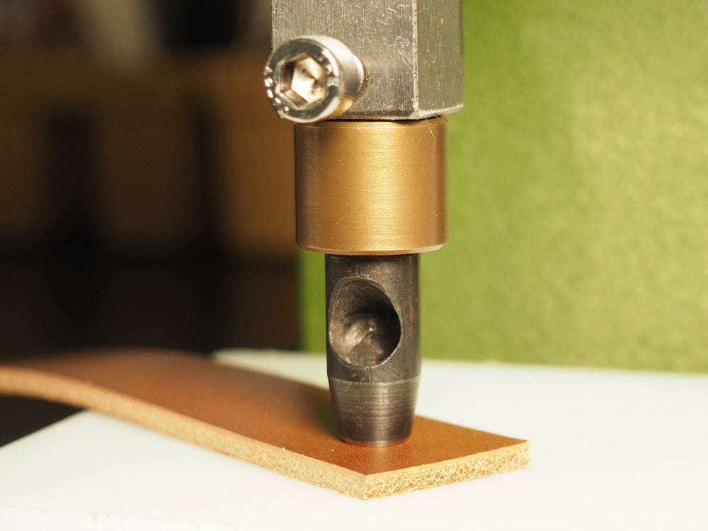 
            
                Load image into Gallery viewer, Brass arbor press adaptor with hole punch
            
        