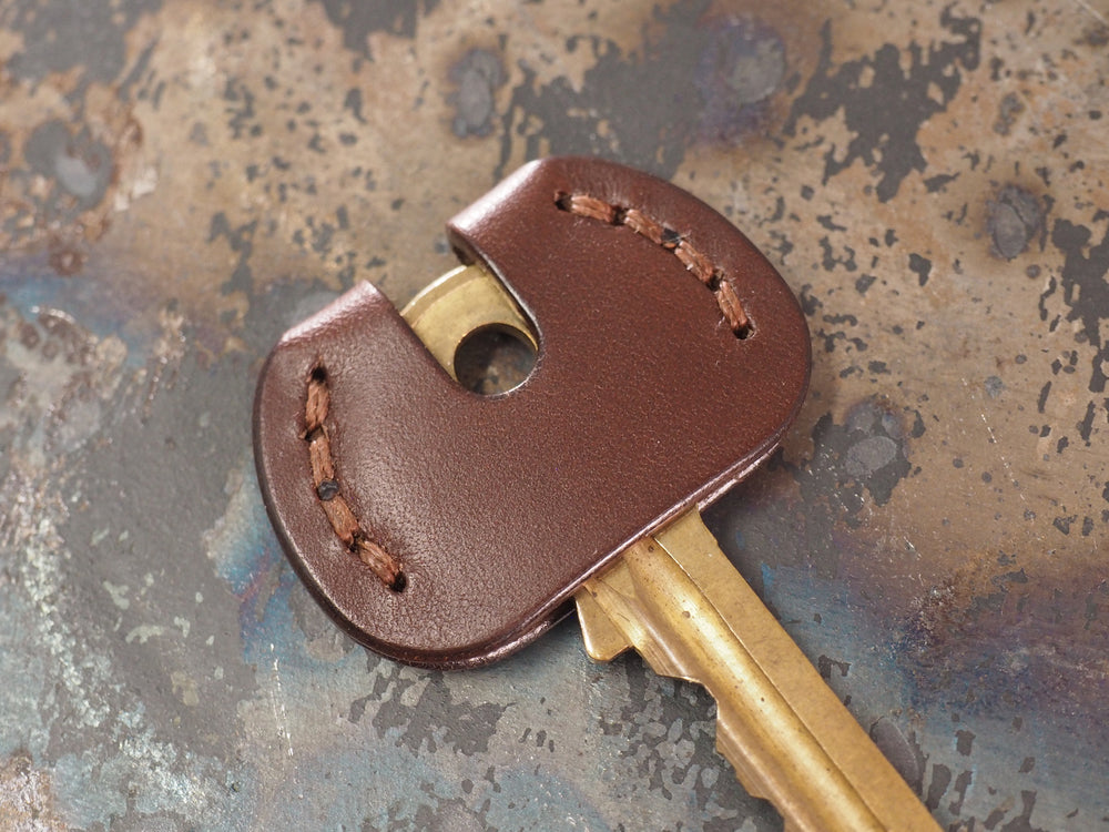
            
                Load image into Gallery viewer, Handcrafted Leather Door Key Cover - Sold Individually - Cognac Tan / Chestnut Brown / Dark Brown / Black
            
        