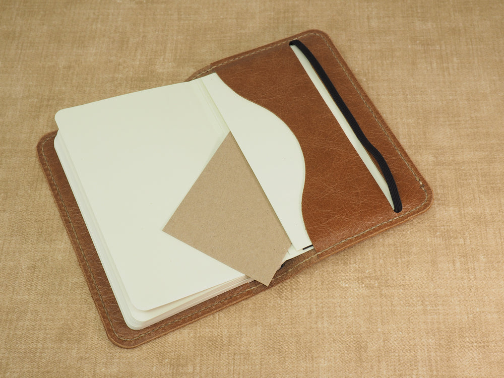 
            
                Load image into Gallery viewer, Handmade &amp;#39;VIP&amp;#39; Leather Notebook Cover - for: Moleskine Classic Softcover Pocket 9x14cm - Old English Tan
            
        